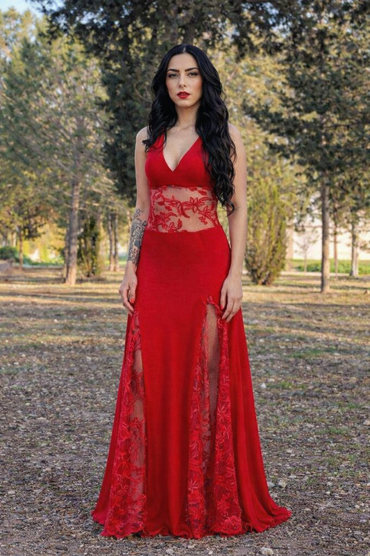 Vestito Rosso Ardente red lace evening gown by t.Ana Couture featuring deep V neckline, sheer floral French lace waist panel and dual high slits.