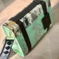 Iridescent Pistacchio Universe handbag, detail view