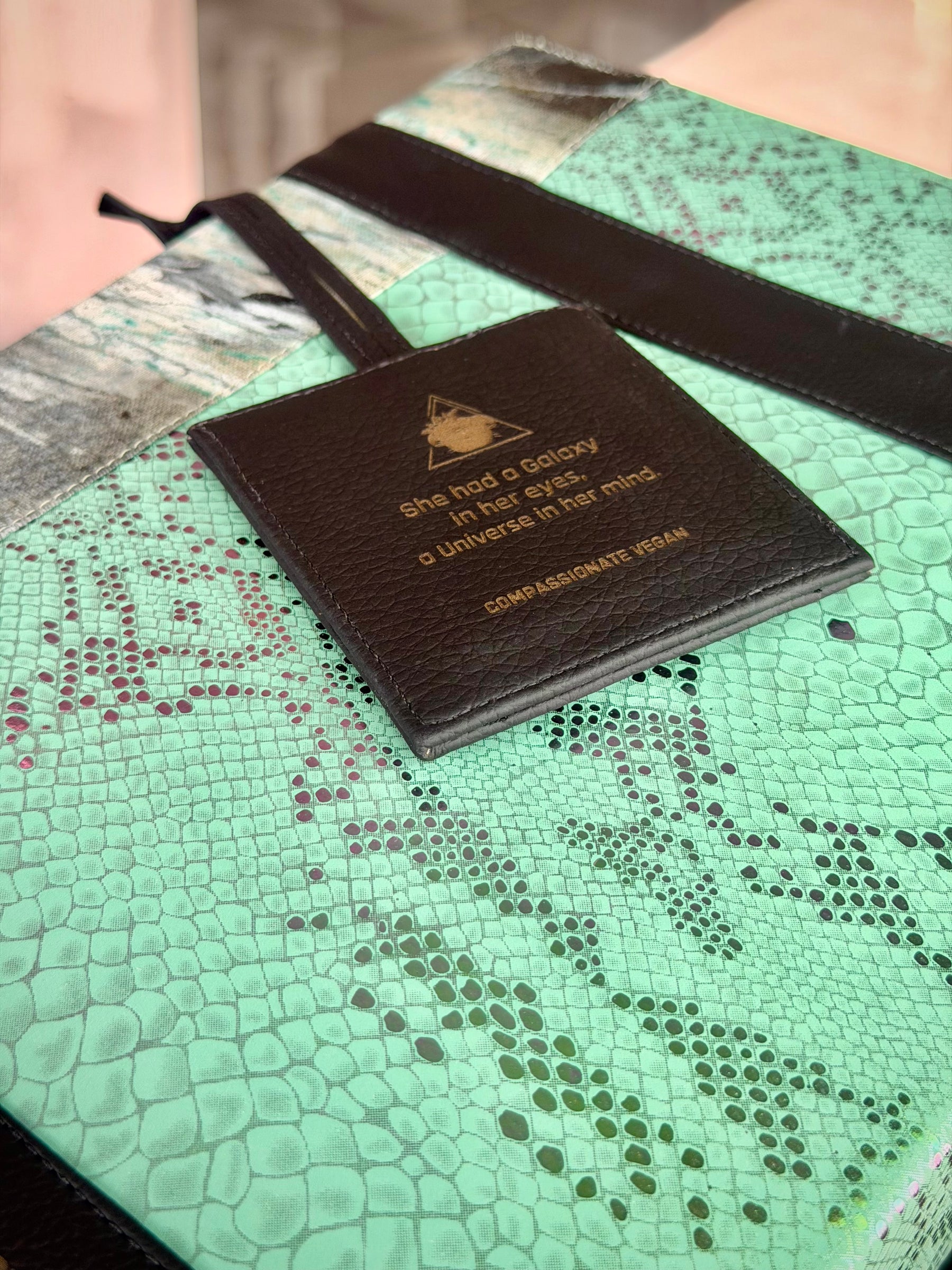 Iridescent Pistacchio Universe green handbag, styled view