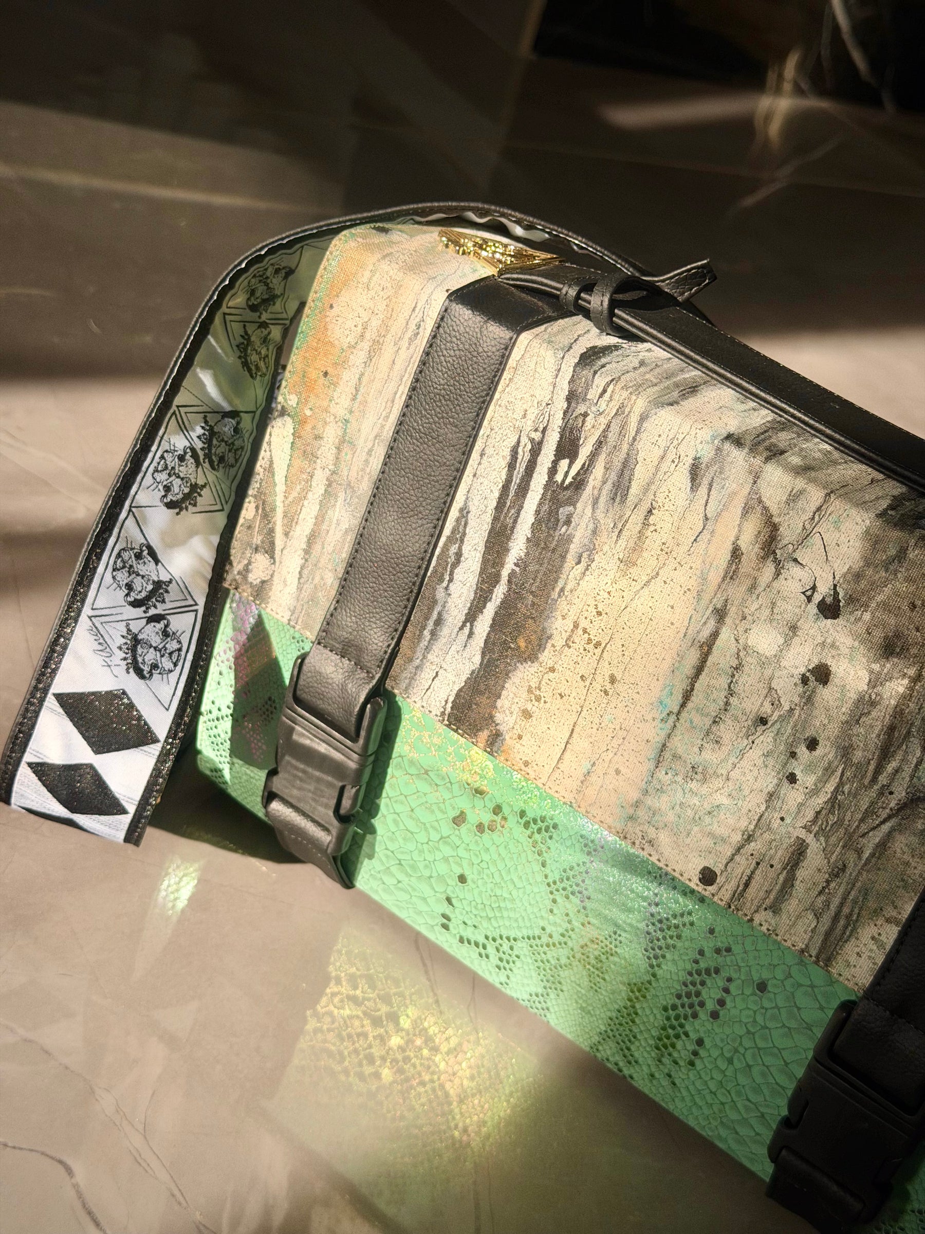 Iridescent Pistacchio Universe green handbag, detail view