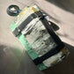 Iridescent Pistacchio Universe hand-painted handbag, styled view