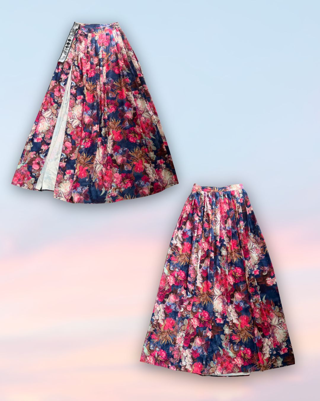 Floral patterned skirt on a light blue and pink gradient background. Exceptional designer floral couture skirt; front and back side by t•Ana Couture. Luxury floral satin couture fabric in blush and fuchsia tones by t•Ana Couture; captured under Mediterranean sunlight with divine flow and effortless elegance. 