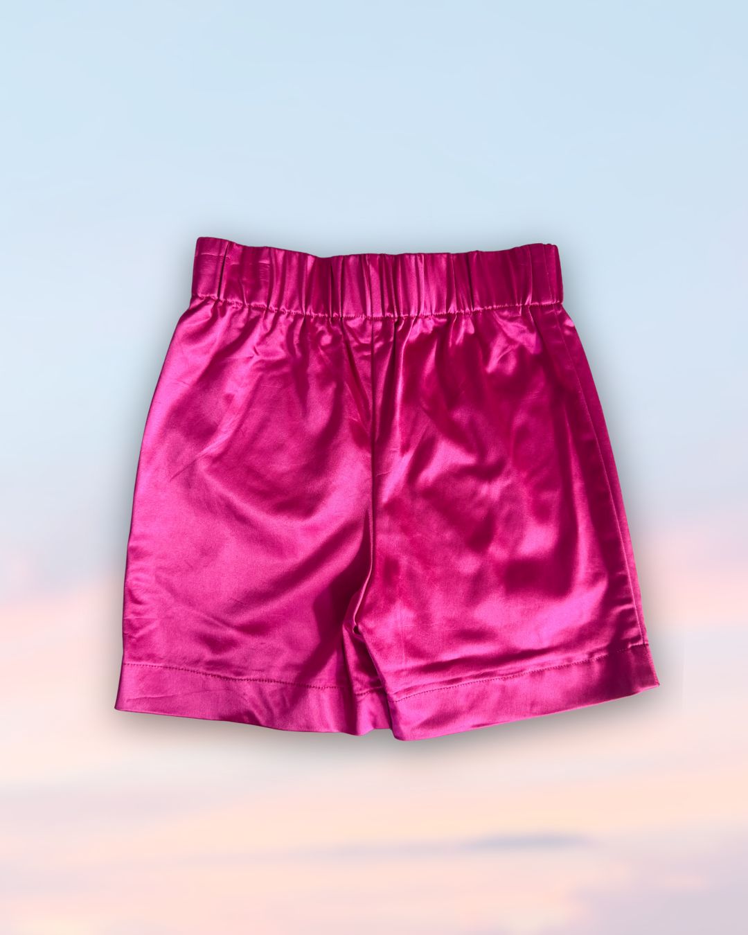 High-quality t•Ana Couture brand label luxury fuchsia satin shorts with Armani brand stretch fabric; captured under Mediterranean sunlight with divine flow and effortless elegance. 