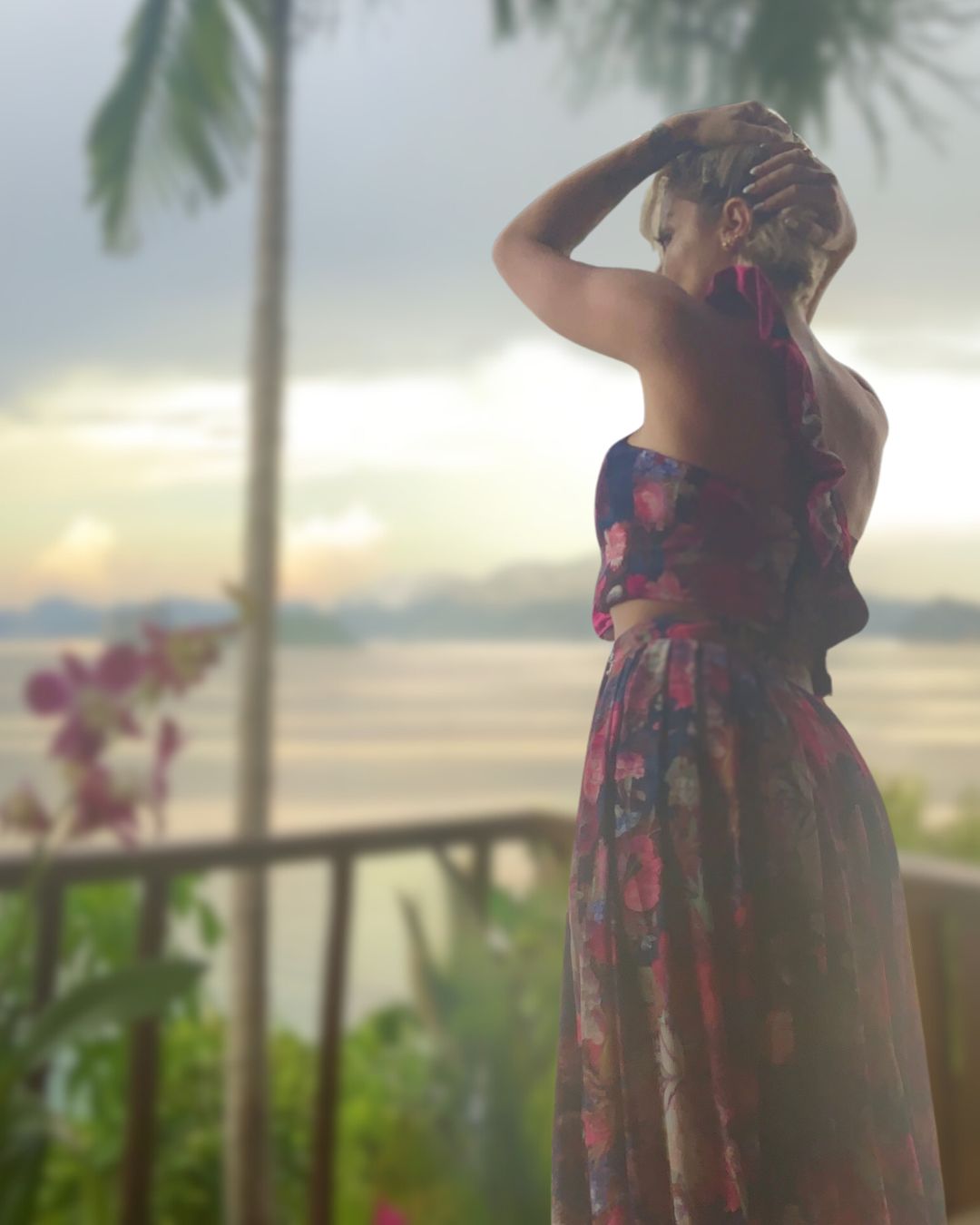 Luxury three-piece floral satin couture set in blush and fuchsia tones by t•Ana Couture; captured under Mediterranean sunlight with divine flow and effortless elegance. Luxury island ambiance vibes.