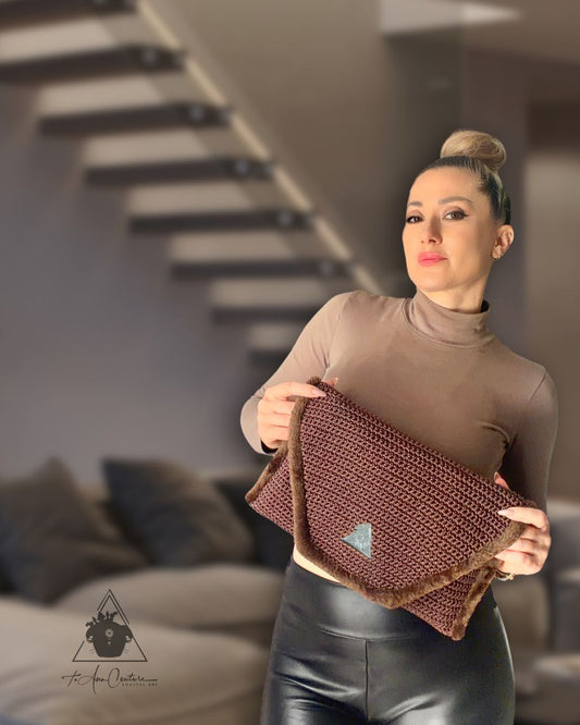 Cocoa Eclipse Knit Handbag in rich cocoa tones; handcrafted knit design with faux fur trim.