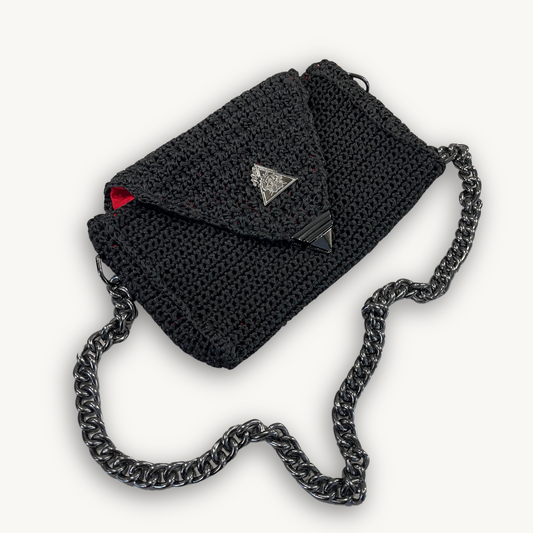 Crimson Eclipse black hand-knit clutch with crimson red lining