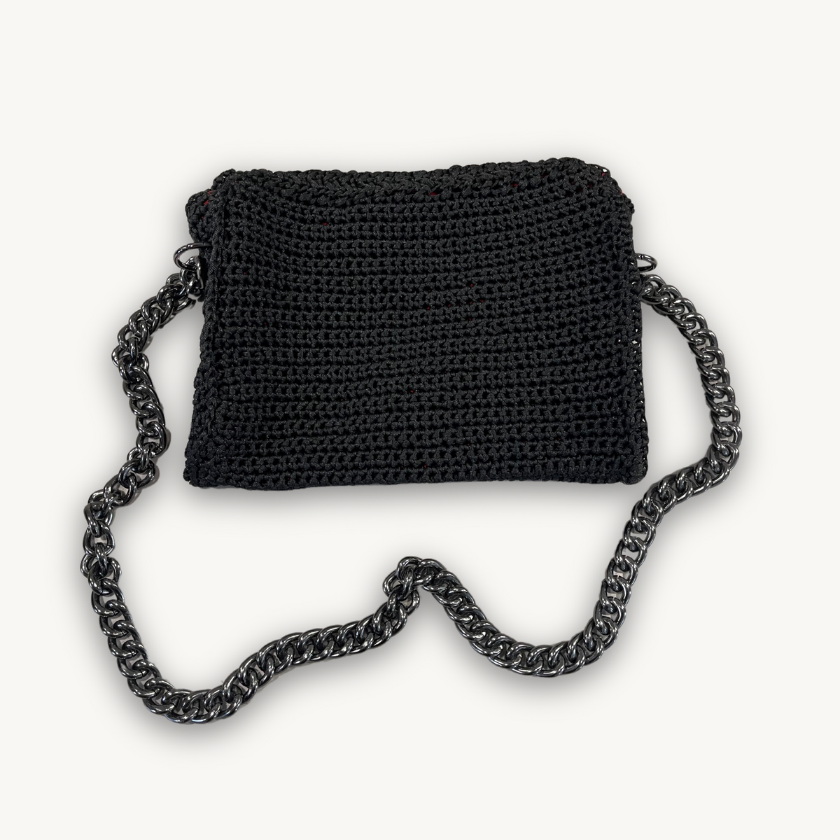 Crimson Eclipse hand-knit clutch, detail view