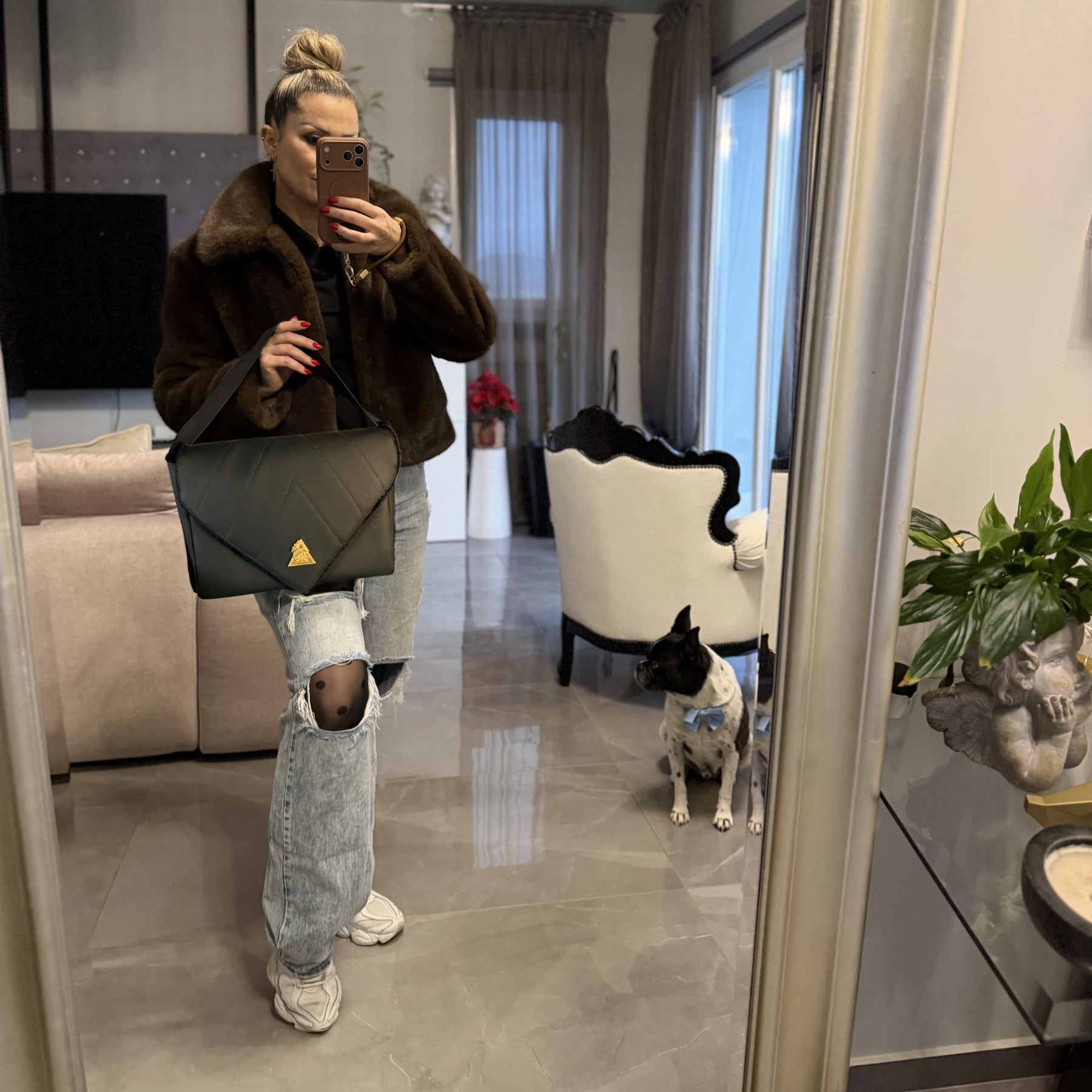El Clásica Elysian Eclipse CarryAll Mini styled in an editorial mirror setting
