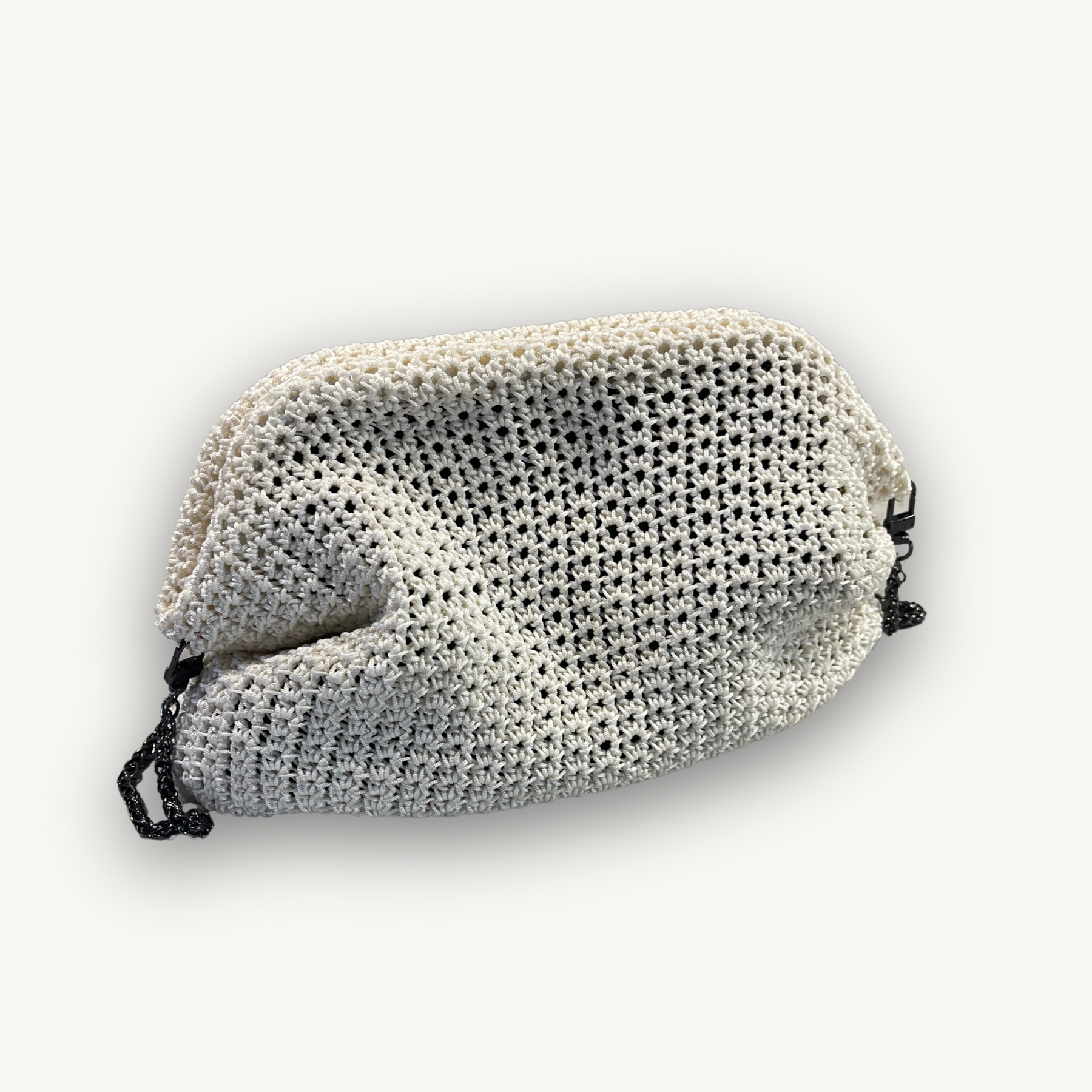 Ivory Solstice cream hand-knit clutch, detail view