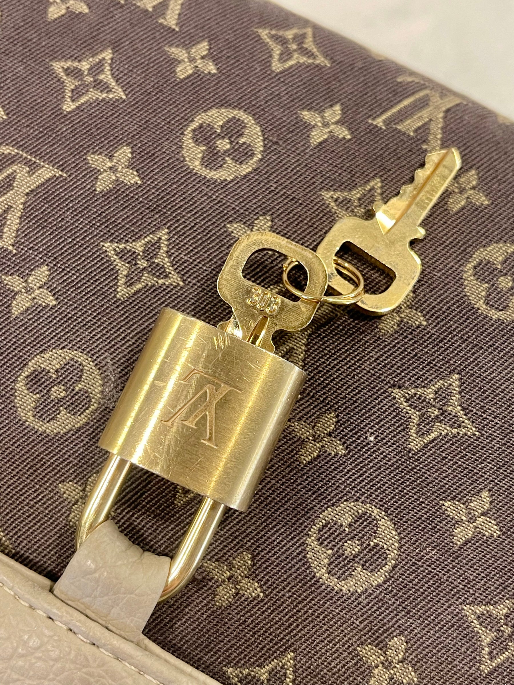 Louis Vuitton Heritage Revival handbag with authentic pre-owned elements