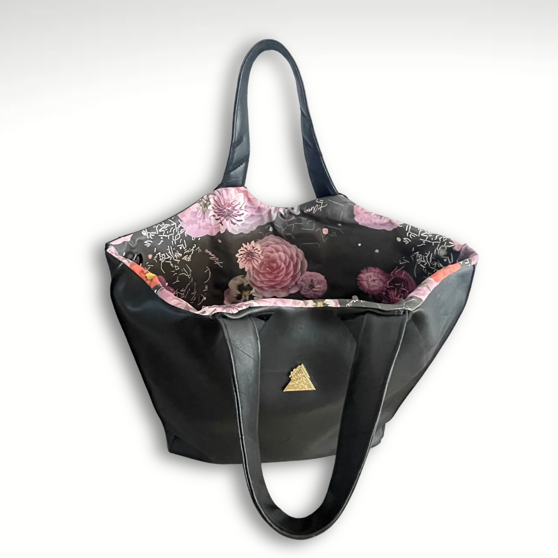 Luminova black quilted handbag, styled view