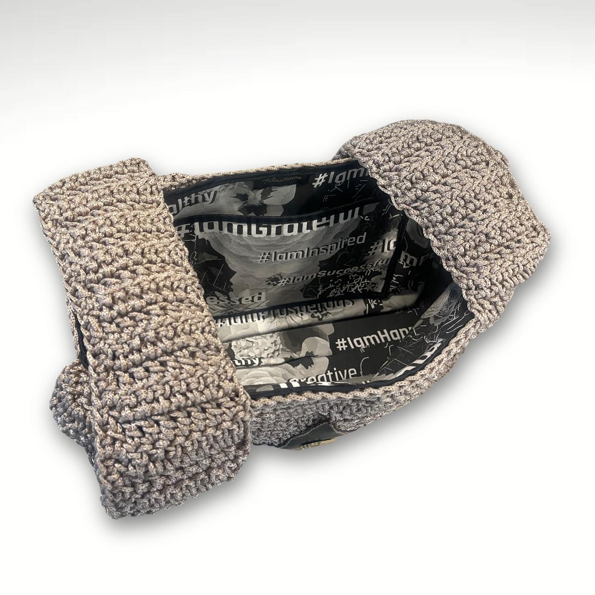 Mystic Mid Aura hand-knit handbag with Maison presentation