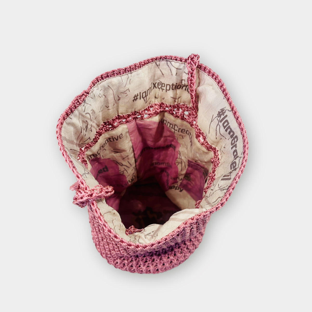 Rosa Magica hand-knit bucket bag, detail view