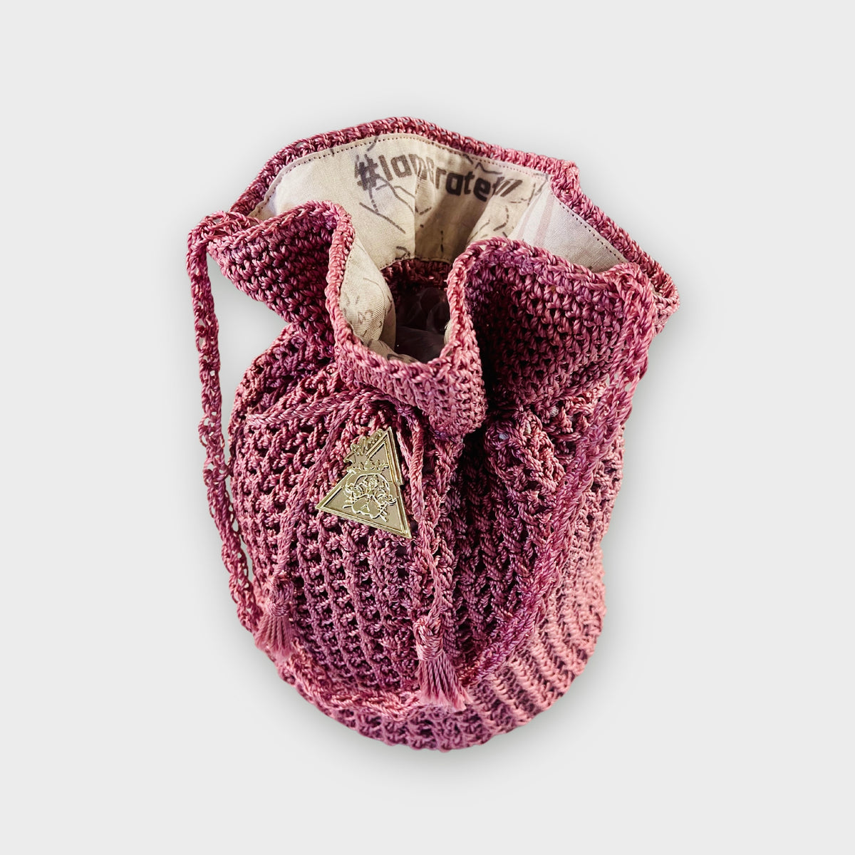 Rosa Magica vivid pink hand-knit bucket bag