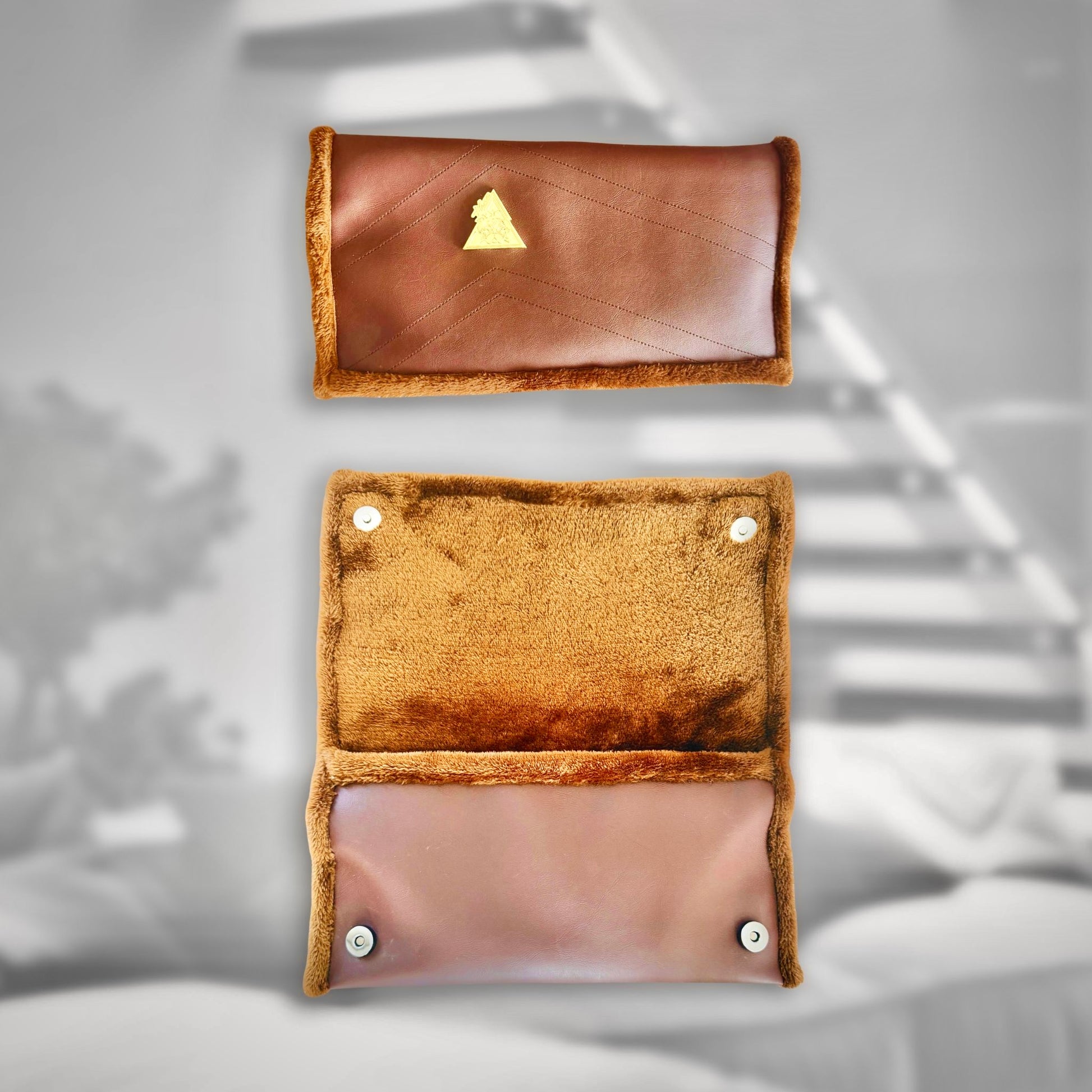 Terra Lusso Multi-Wear Clutch in chocolate brown, premium vegan leather with faux-fur interior and metal logo plate.