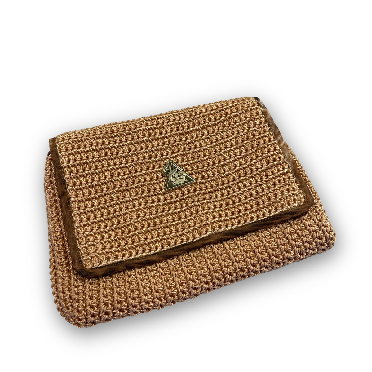 Thalassa Auria hand-knit clutch, styled view