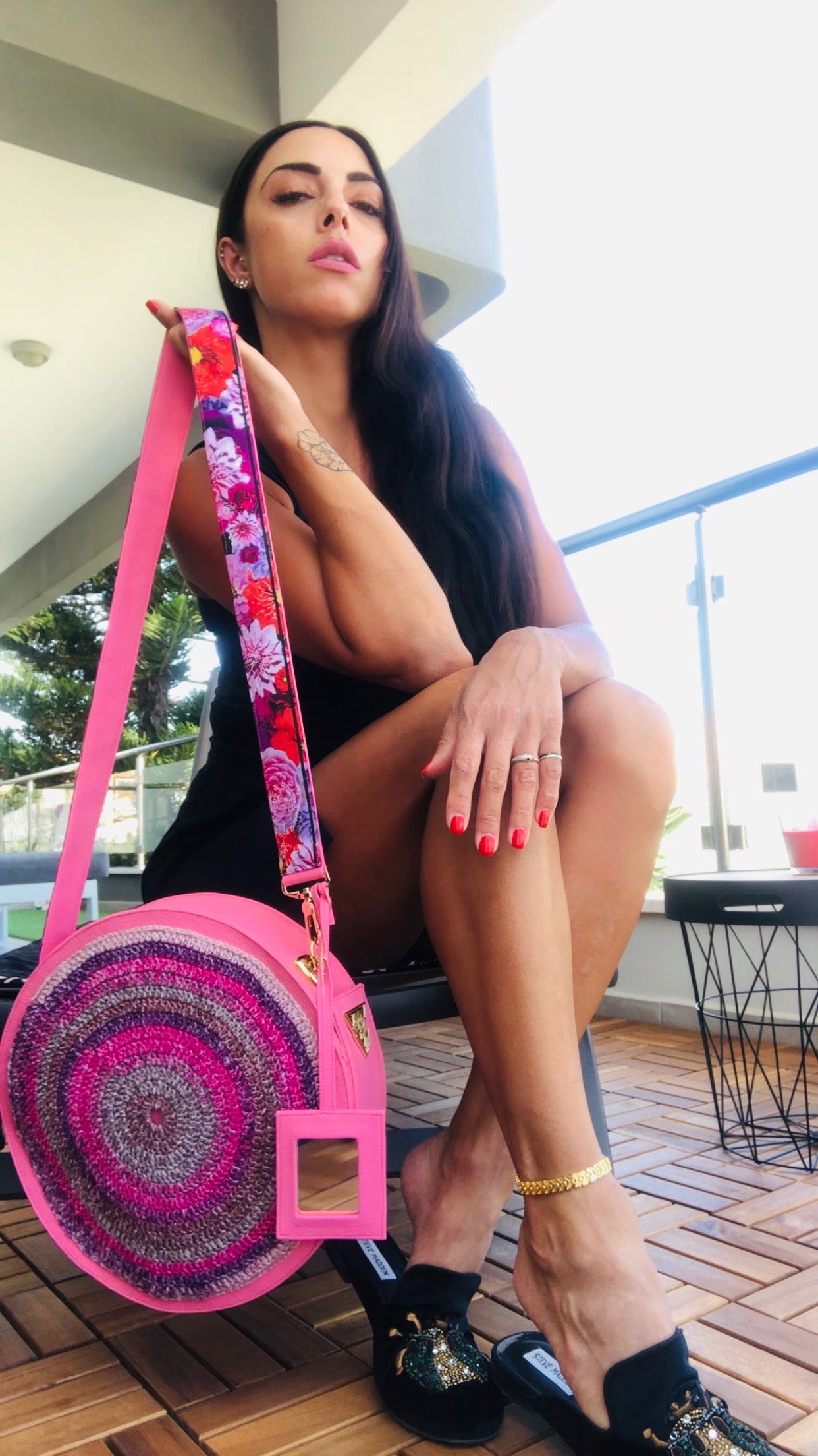 Fluorescent Pink Passion pink and purple hand-knit handbag