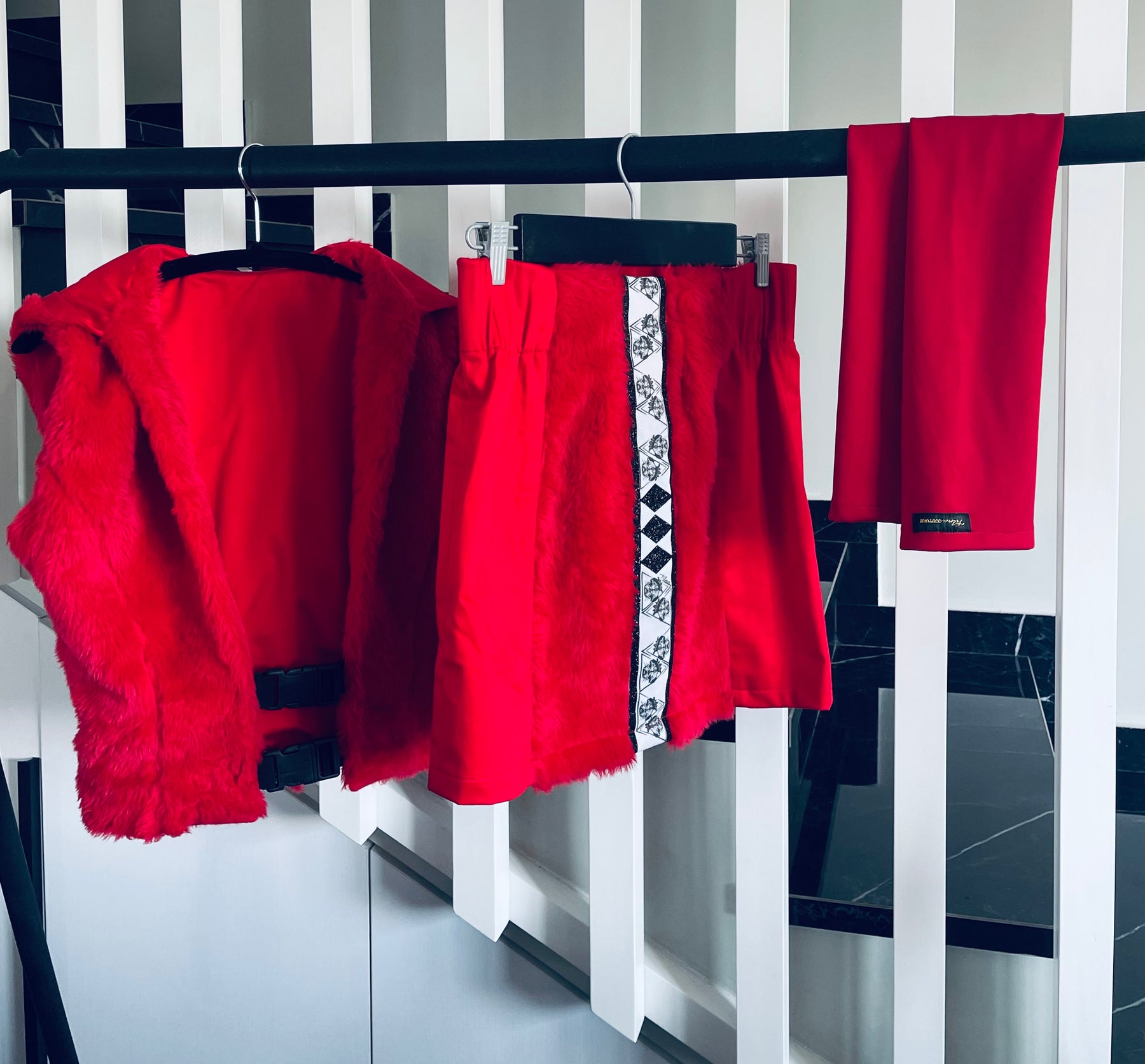 La Passione Rossa hooded vest and mini skirt, styled view